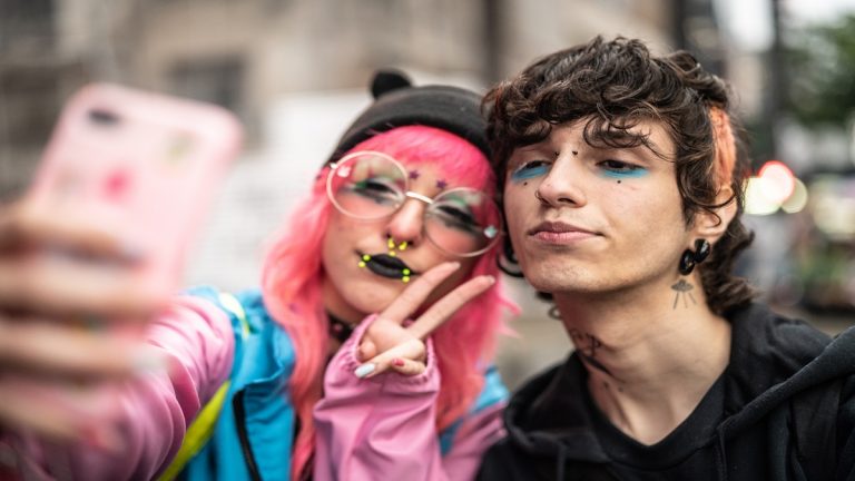 Alternative Lifestyle Young Couple Taking A Selfie