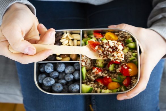 Lunchbox With Quinoa Salad With Tomato And Cucumber, Blue Berry And Trail Mix